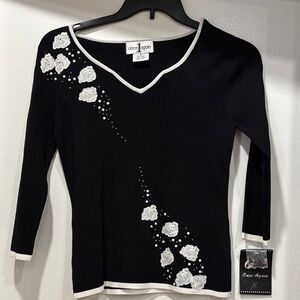 Vintage Black V-Neck Sweater with White Floral Design